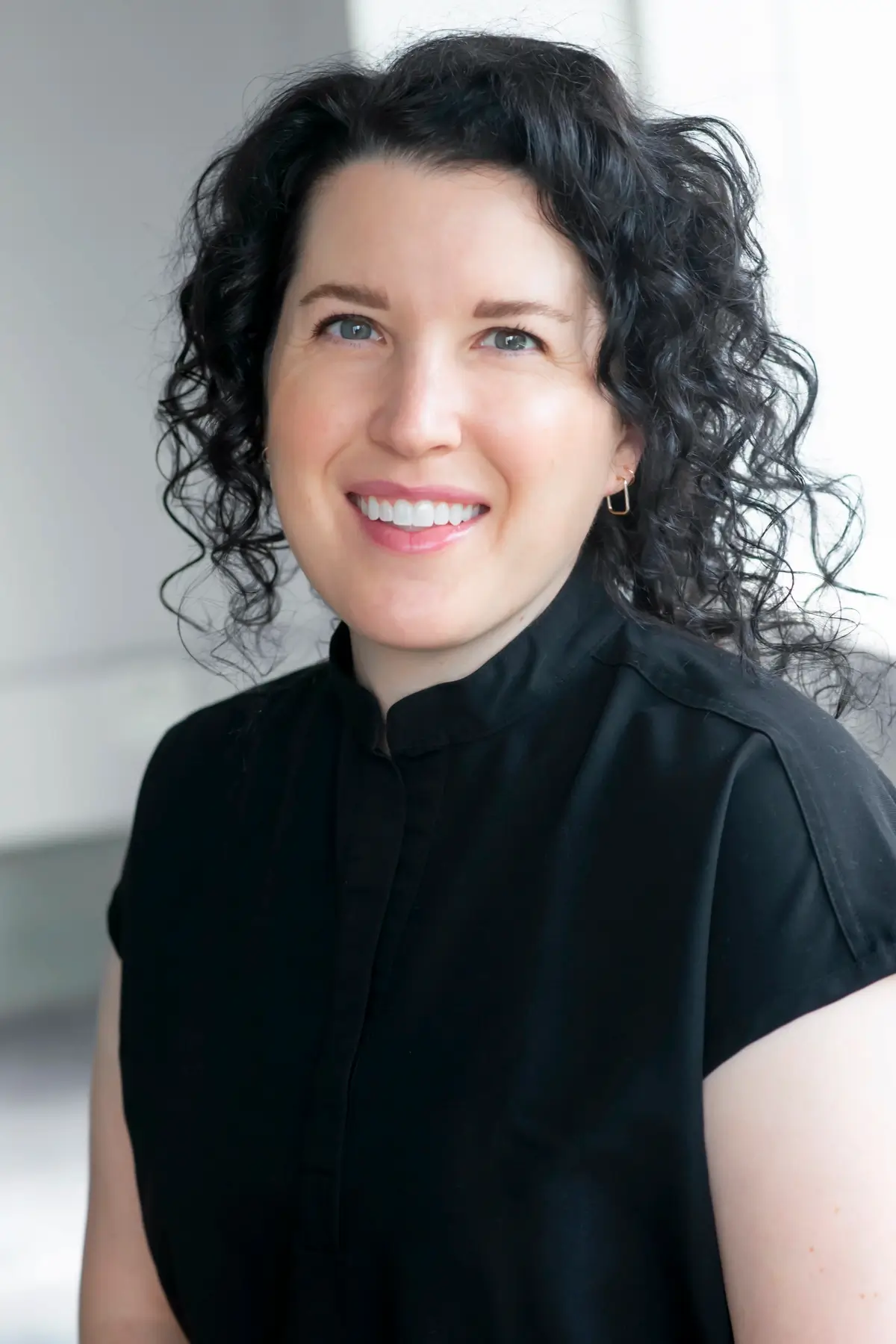 Dr. Rachel Hoffman smiling in her office